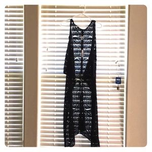 Knit sleeveless cover up.